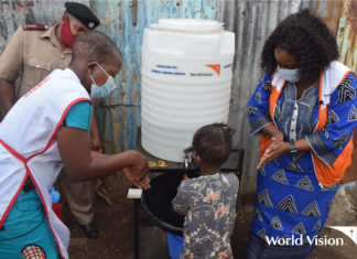 Hand washing by a child.