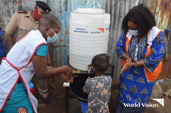 Hand washing by a child.