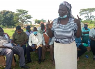 Environmental activists in a consultative meeting with the EACOP project affected people in Kitenga Mubende district