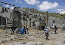 Miners at an open cast Granite mine in Mutoko