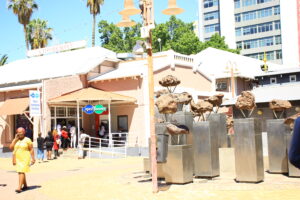 People in Windhoek's Central Business District (CBD) queuing to withdraw money at a local ATM.