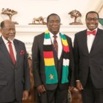 Zimbabwe’s President posing for a photo with his guests.